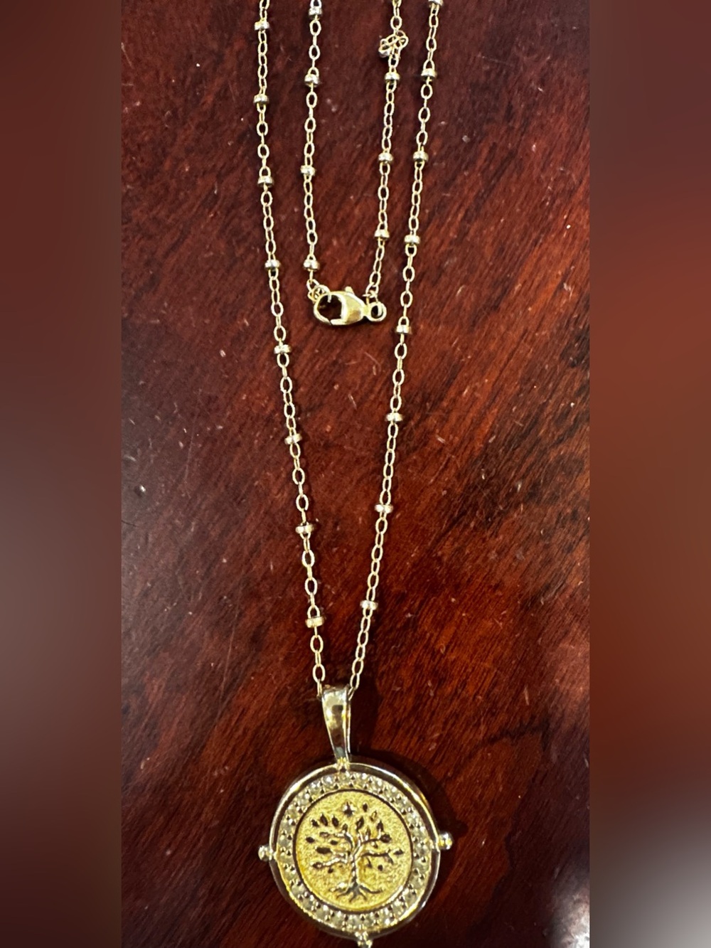 Jane Win petite embellished FAITH necklace. With Jane Win storage Pouch.